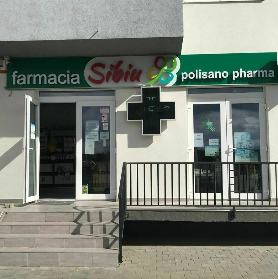 Producție outdoor pentru farmacie în Sibiu Realizare producție outdoor pentru crucea farmaciei și panoul publicitar luminat, incluzând firme luminoase personalizate.