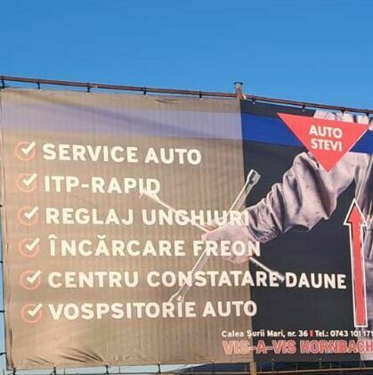 Banner mare pentru firmă de reparații auto - Realizat și montat de Media Impact. Banner de mari dimensiuni realizat și montat de Media Impact pentru firmă de reparații auto, publicitate exterioară eficientă.